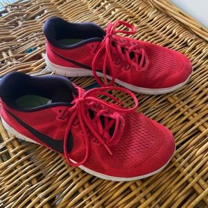 Red Nike tennis shoes